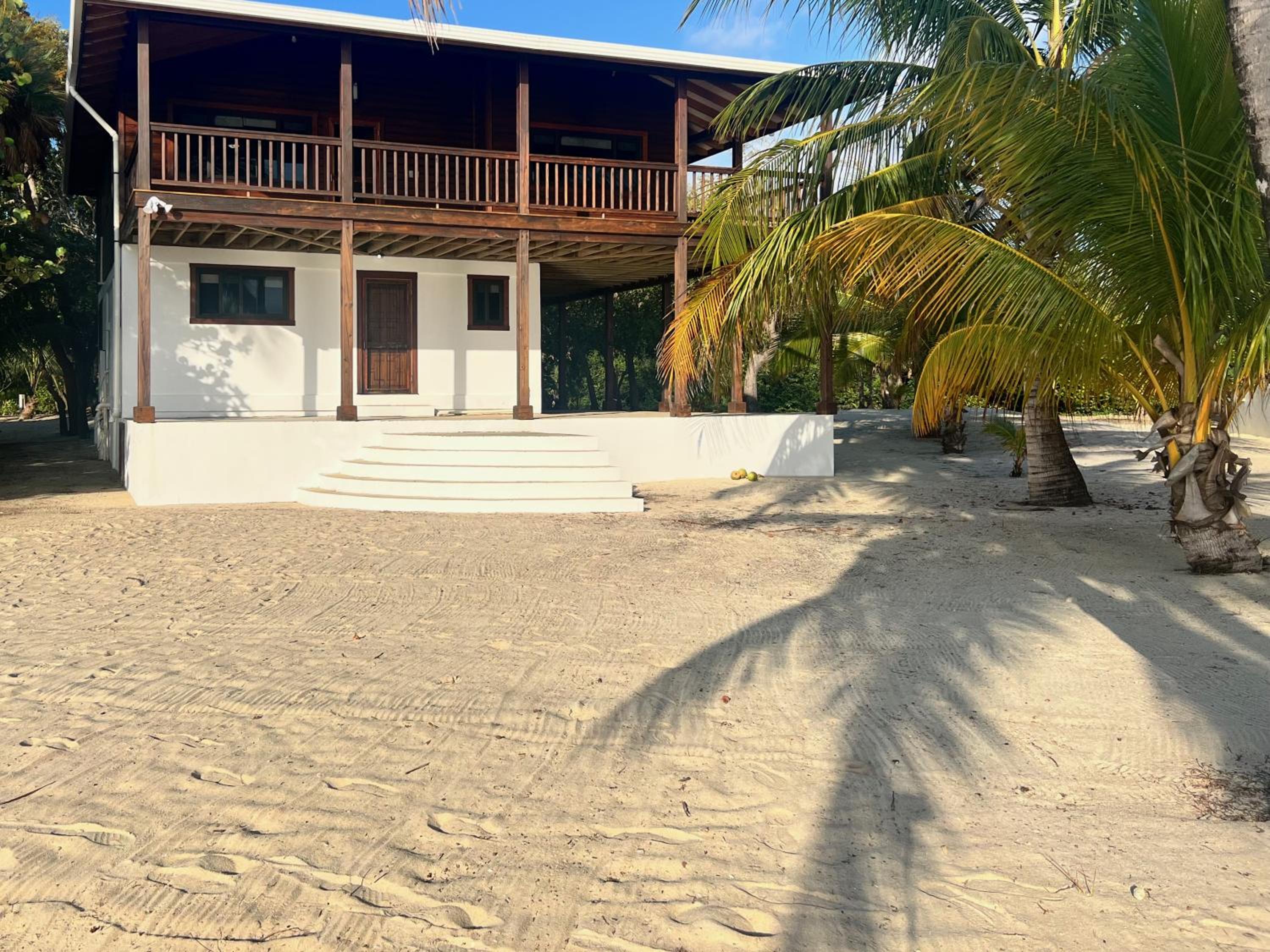 Beachfront Home Kissin' the Caribbean - BELLA SWAY BELIZE