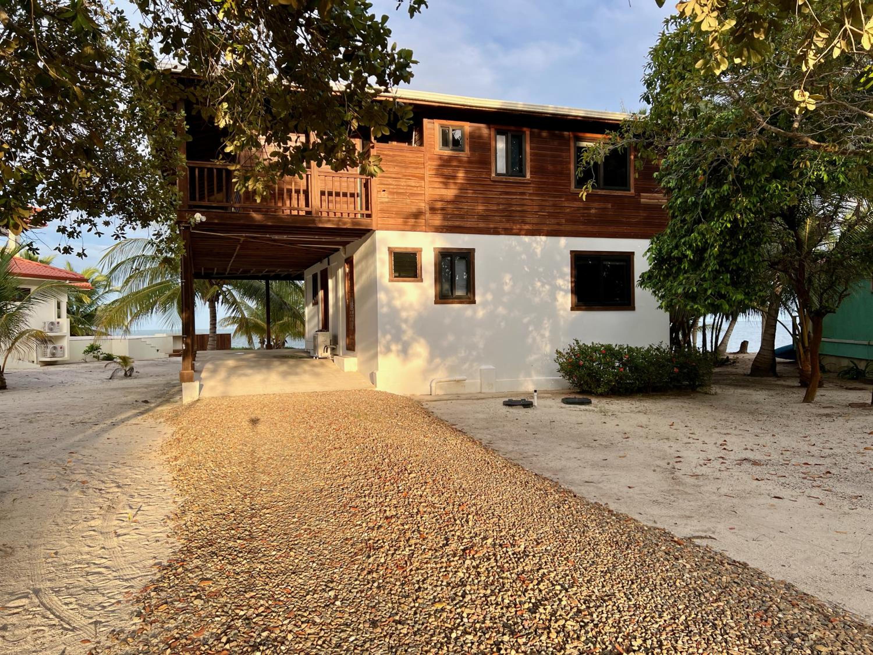 Beachfront Home Kissin' the Caribbean - BELLA SWAY BELIZE