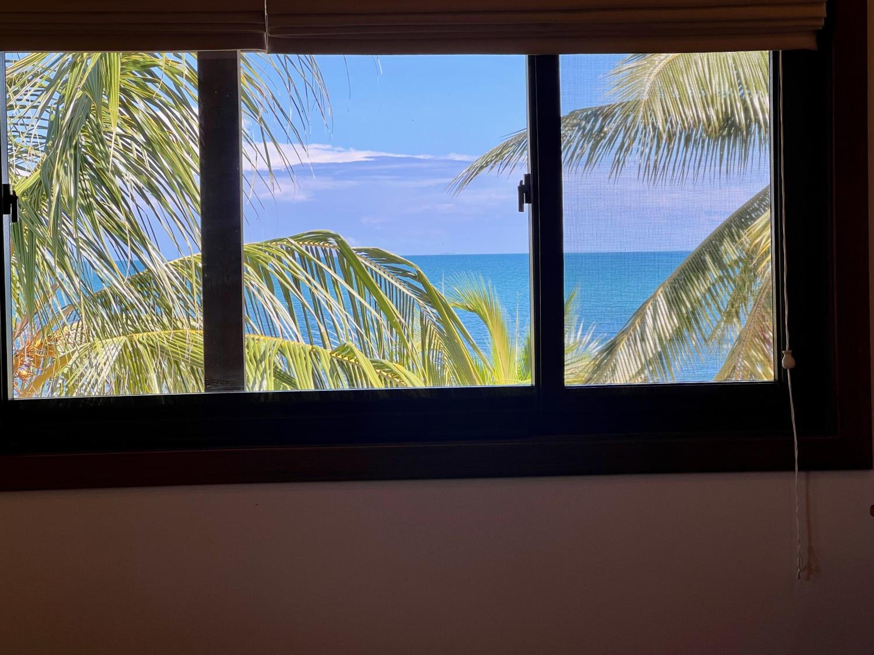 Beachfront Home Kissin' the Caribbean - BELLA SWAY BELIZE