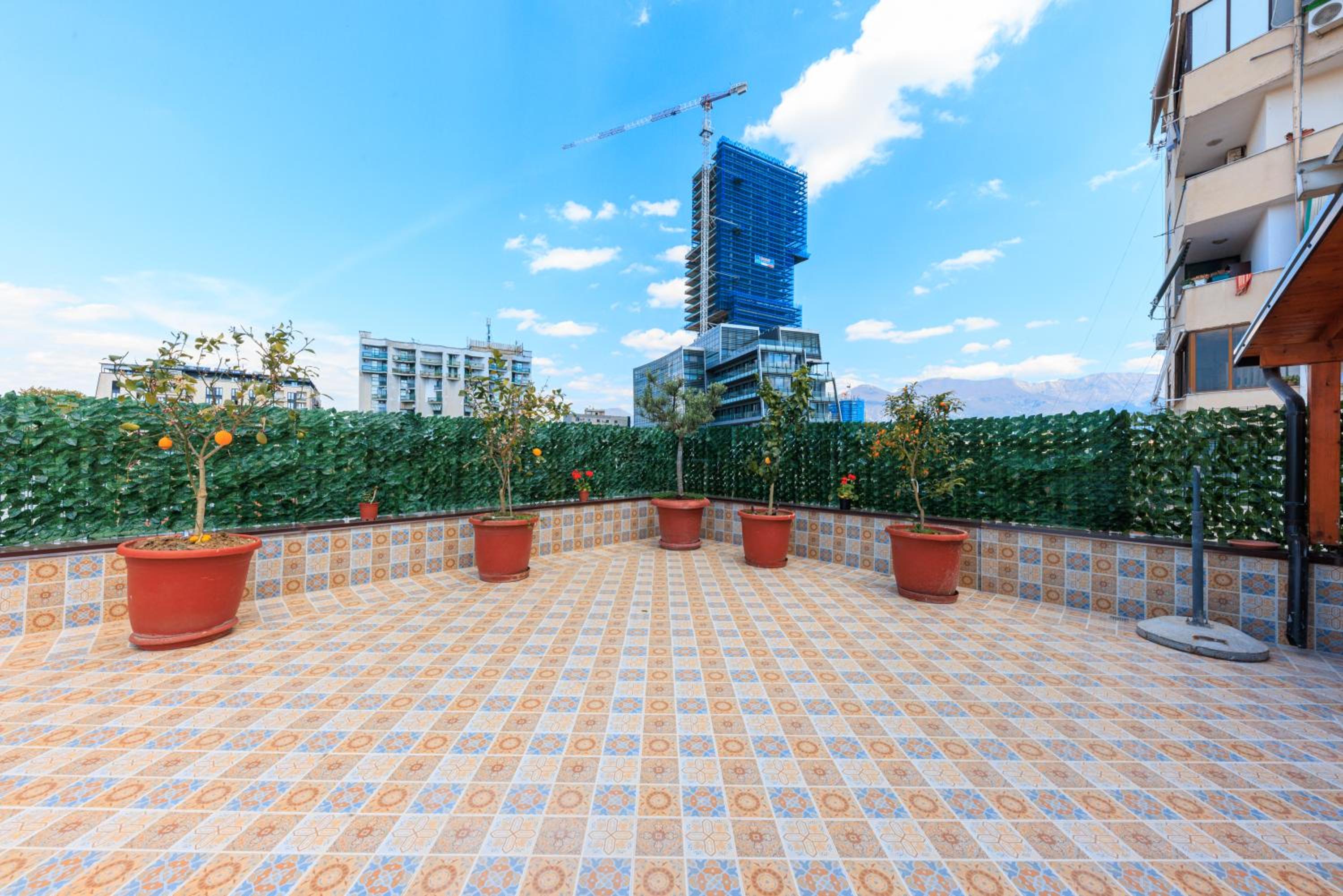 One-bedroom rooftop skyline central hidden gem in Tirana