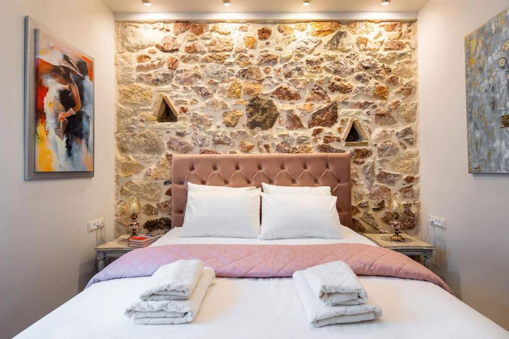 Queen's stone legend, royal living by Acropolis