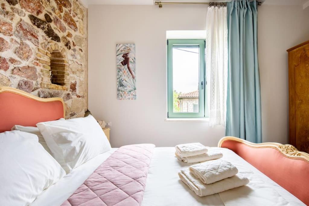Queen's stone legend, royal living by Acropolis