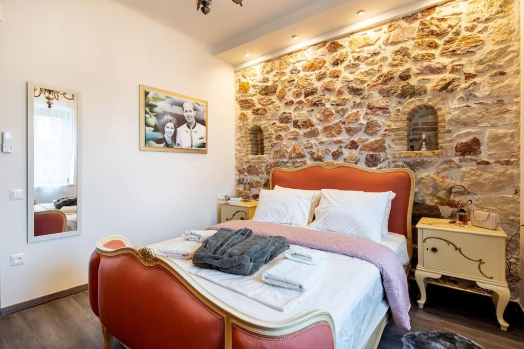 Queen's stone legend, royal living by Acropolis