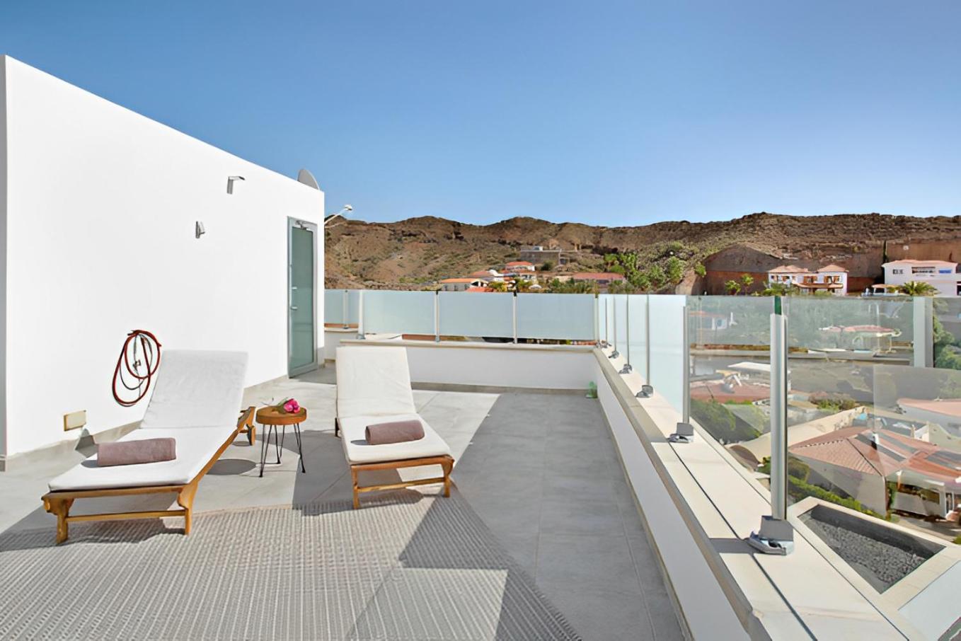 Luxury Boho Villa with Heated Pool, Rooftop and Panoramic Sea View in Amadores