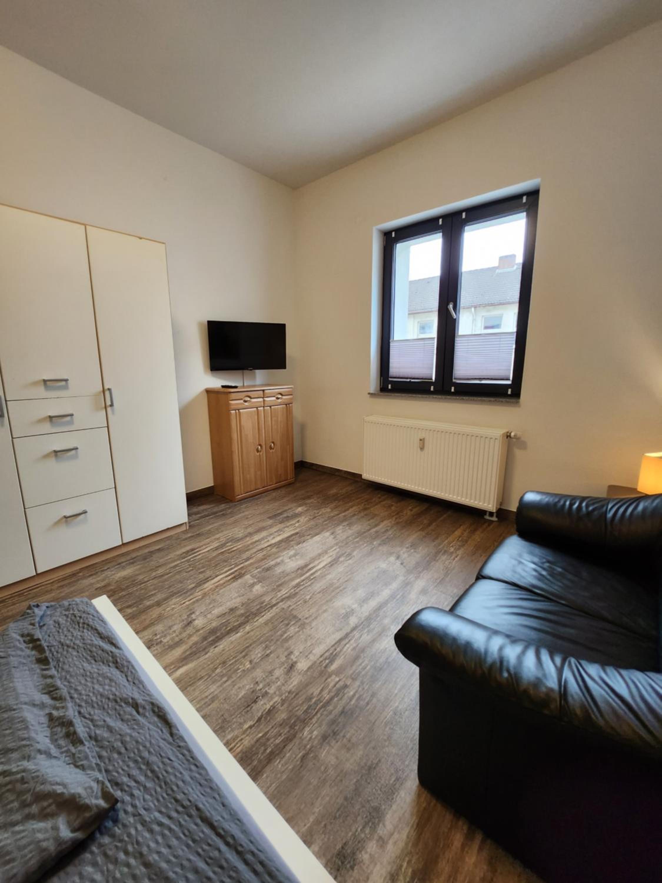 BIELEFELD CITY APARTMENTS - komfortable Einzelzimmer und Doppelzimmer - moderne Badezimmer, schnelles WLAN, Self-Check-In