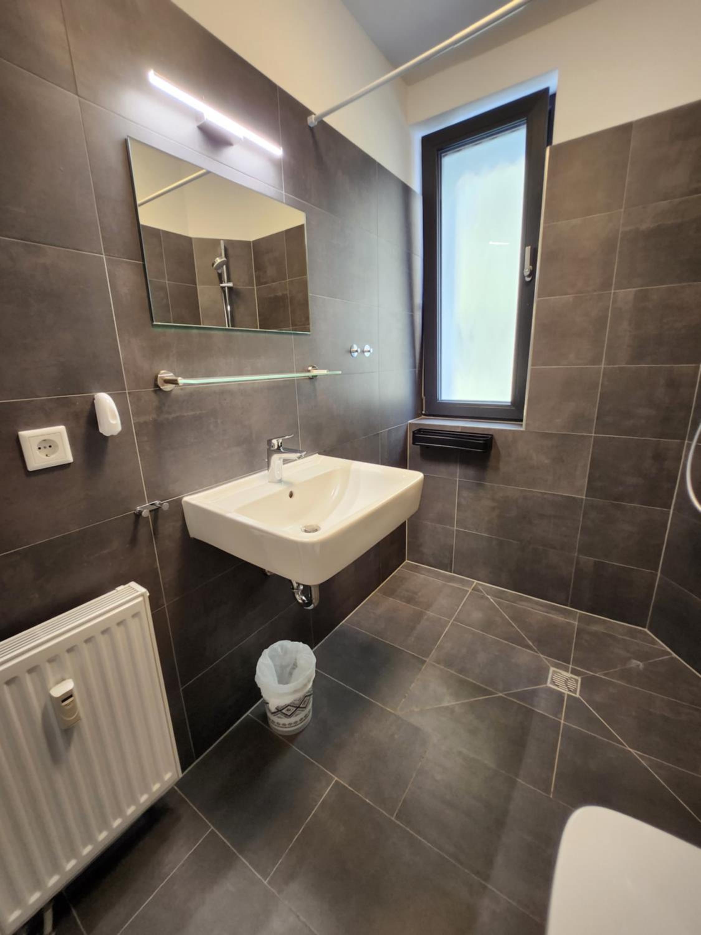 BIELEFELD CITY APARTMENTS - komfortable Einzelzimmer und Doppelzimmer - moderne Badezimmer, schnelles WLAN, Self-Check-In