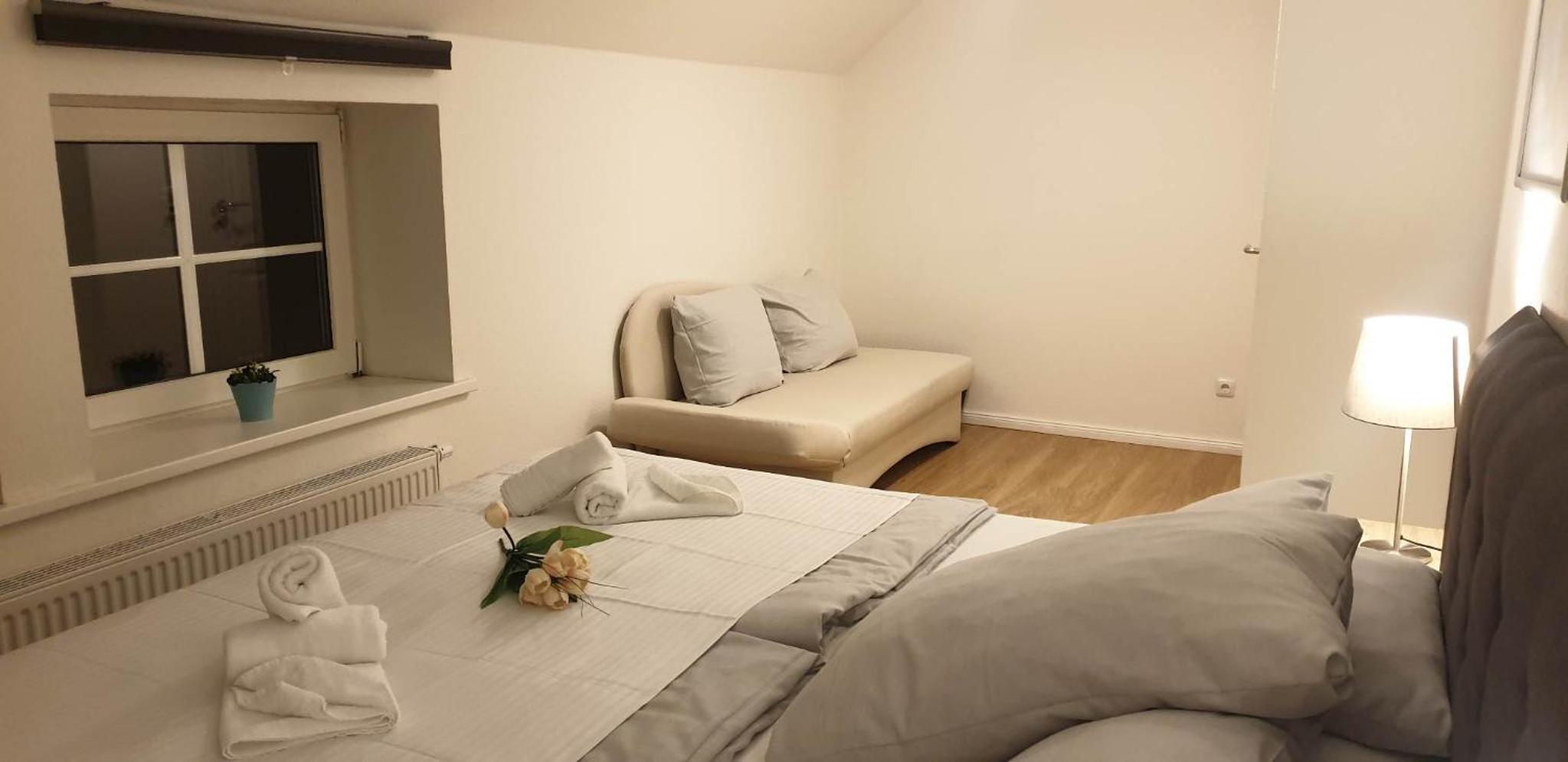 Apartment with Garden and City View