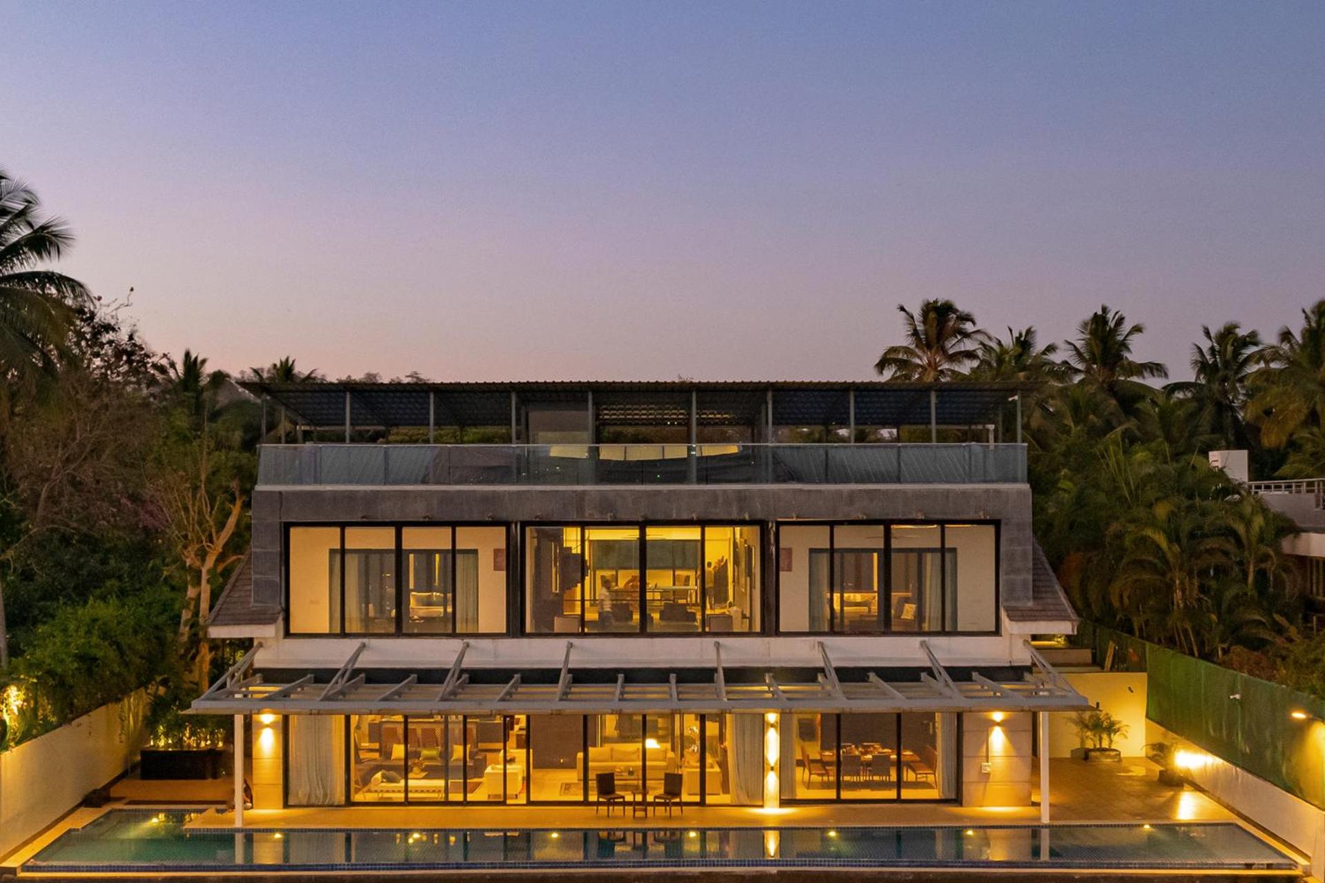 Oceanic Sunsets with River View, Comp Breakfast & Infinity Pool at StayVista