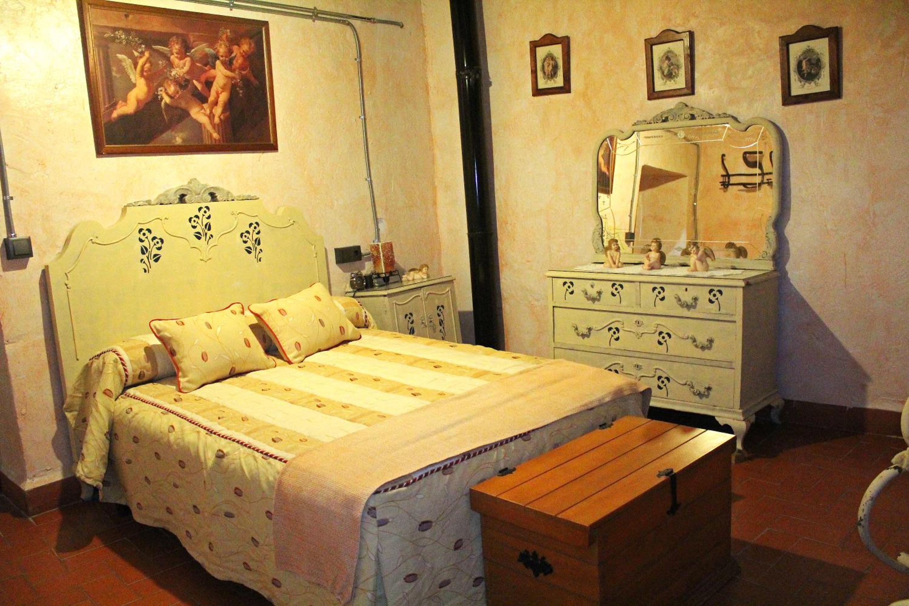 Vivienda de estilo rústico con piscina LA GRANÁ