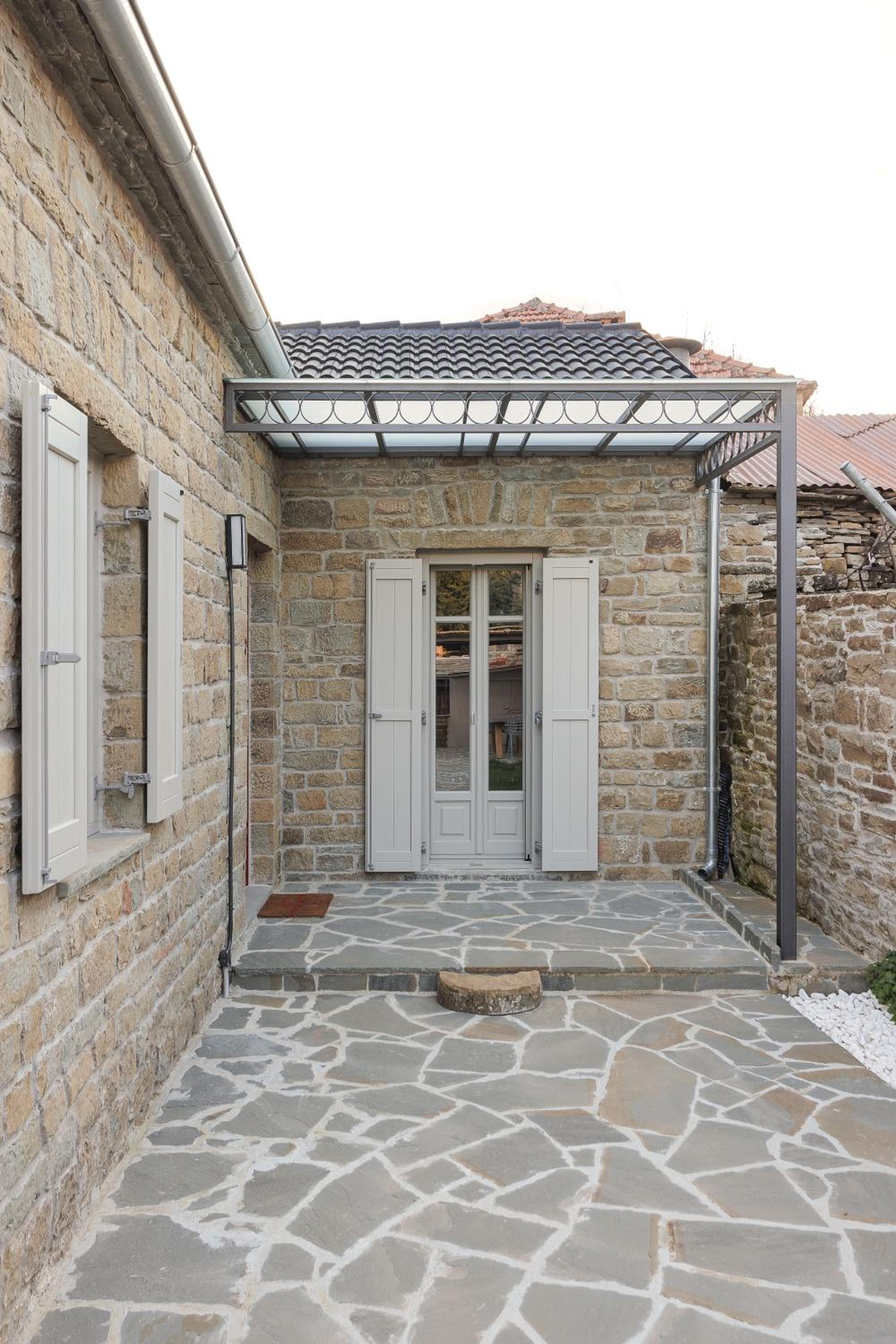 LozArt Traditional Stone House