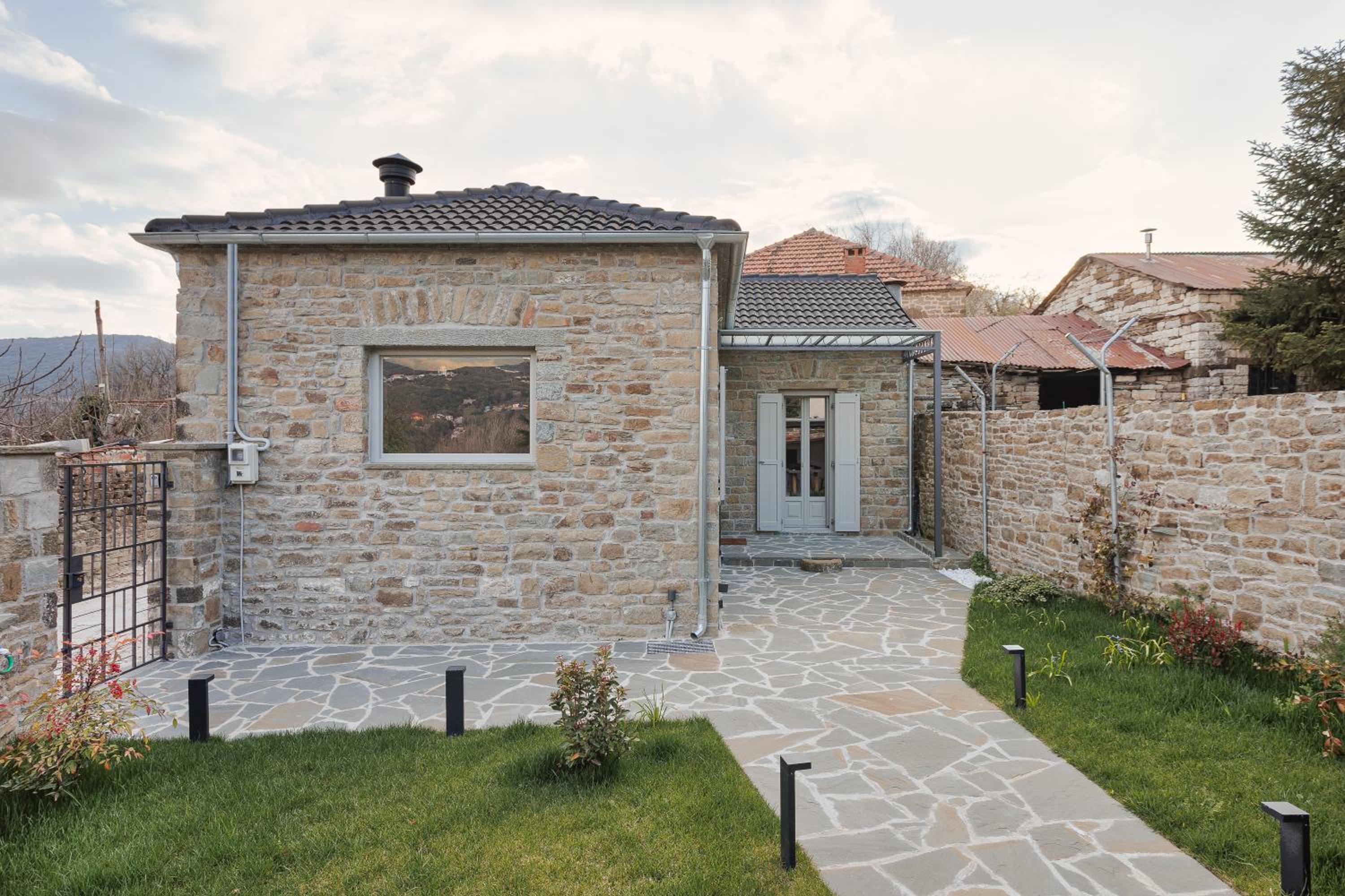 LozArt Traditional Stone House
