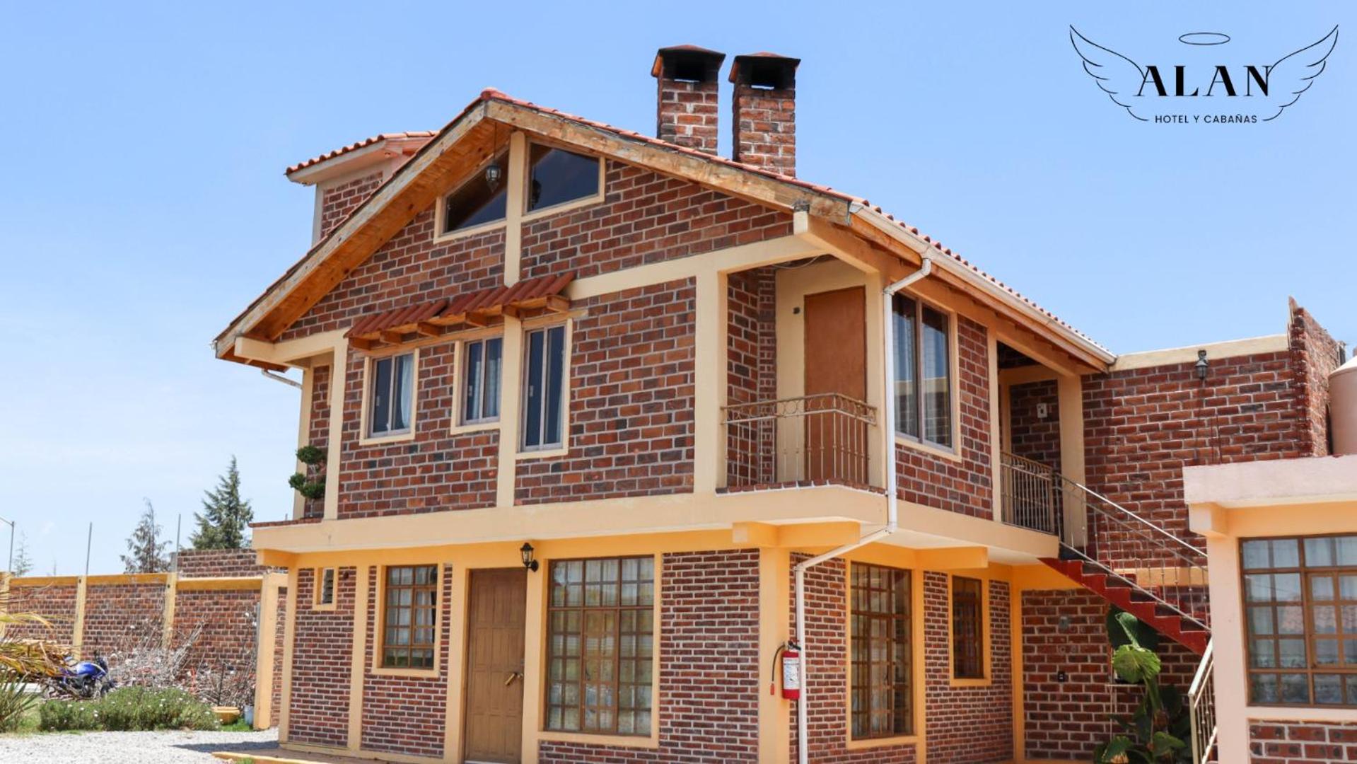 Hotel y Cabañas Alan - Image 1