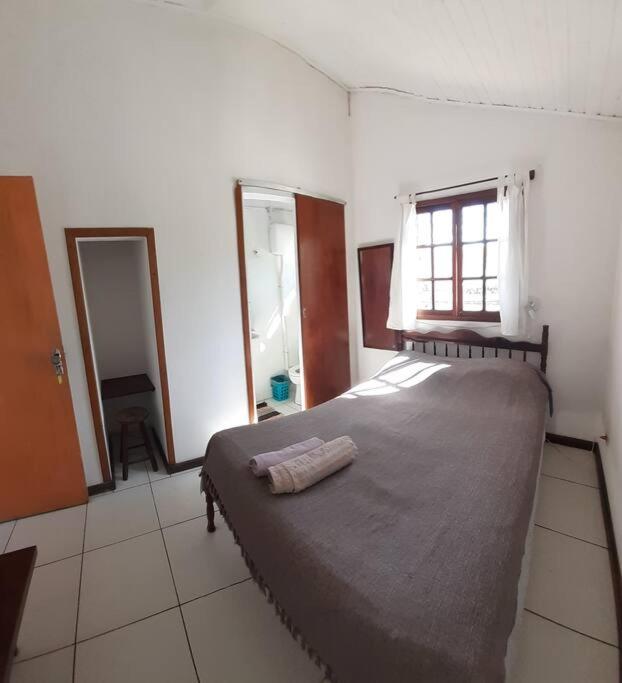Casa grande,3 min a pé do Centro, grupos, familias