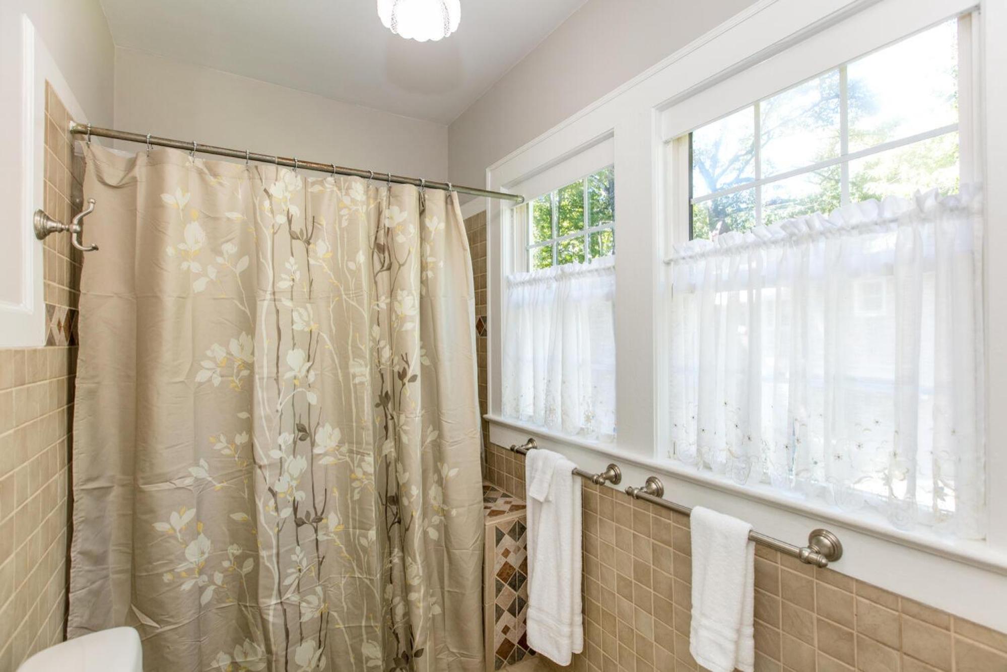 Roomy 5BR Bungalow with Backyard, Walk to Downtown