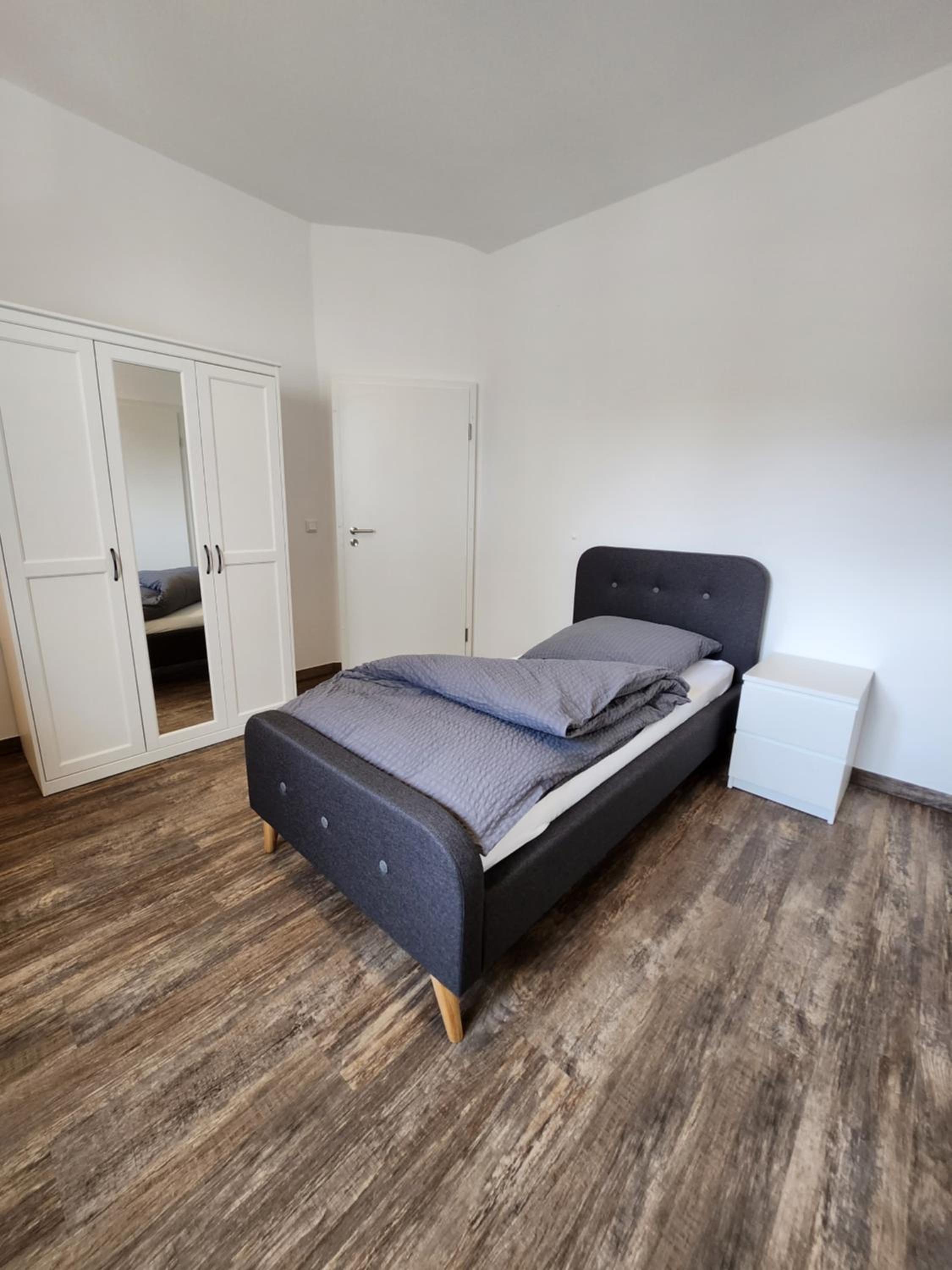 BIELEFELD CITY APARTMENTS - komfortable Einzelzimmer und Doppelzimmer - moderne Badezimmer, schnelles WLAN, Self-Check-In