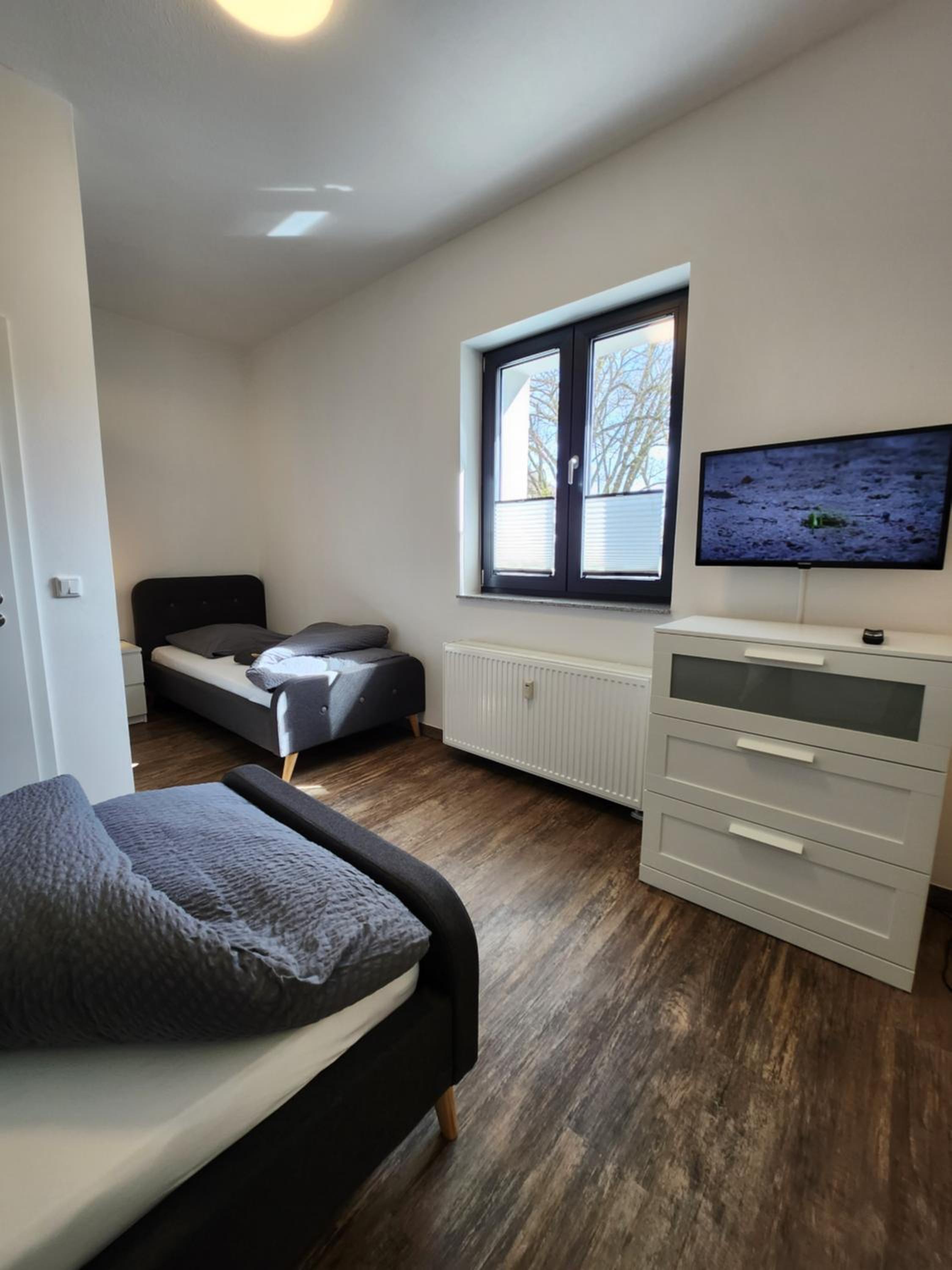 BIELEFELD CITY APARTMENTS - komfortable Einzelzimmer und Doppelzimmer - moderne Badezimmer, schnelles WLAN, Self-Check-In