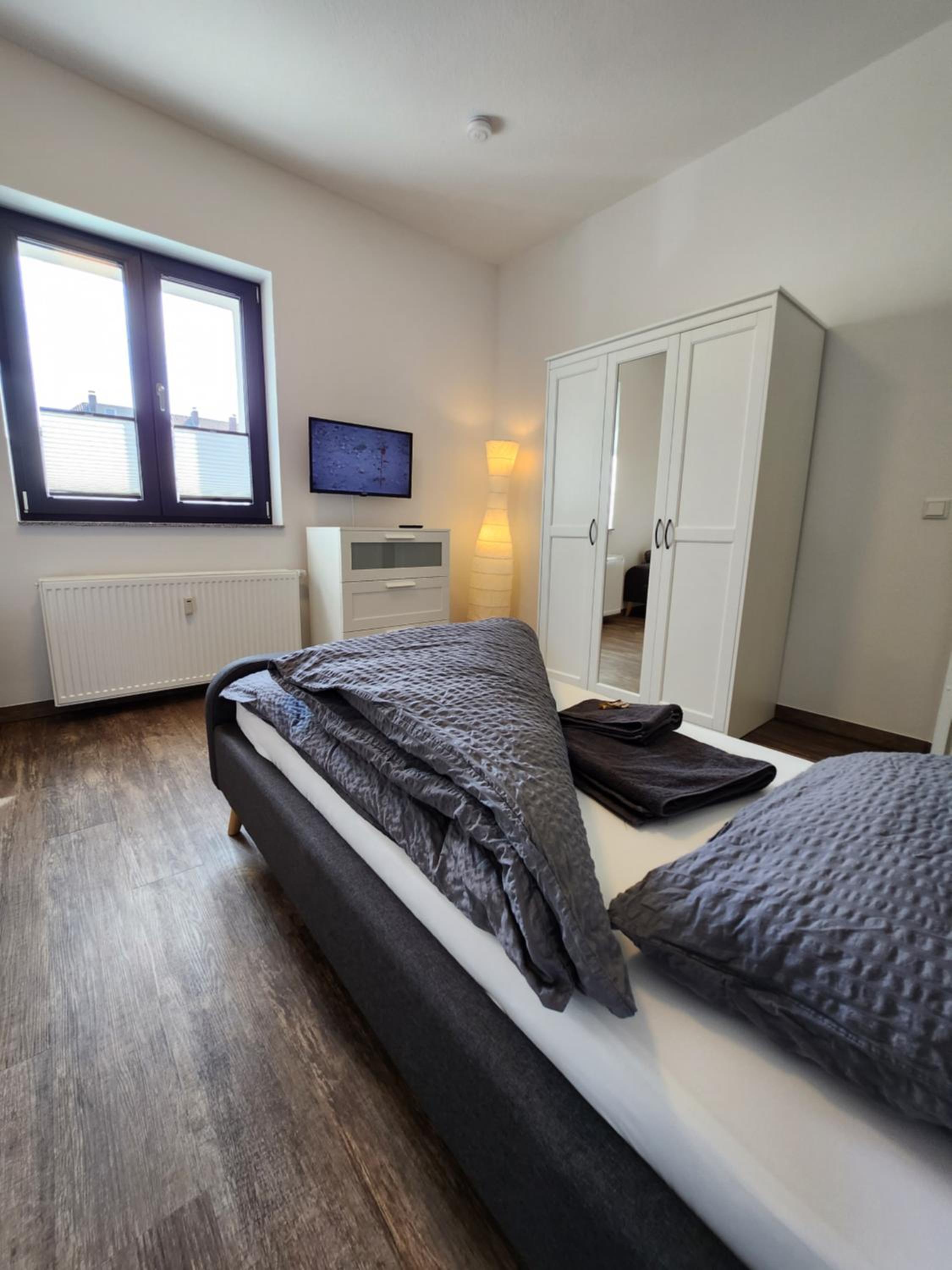 BIELEFELD CITY APARTMENTS - komfortable Einzelzimmer und Doppelzimmer - moderne Badezimmer, schnelles WLAN, Self-Check-In