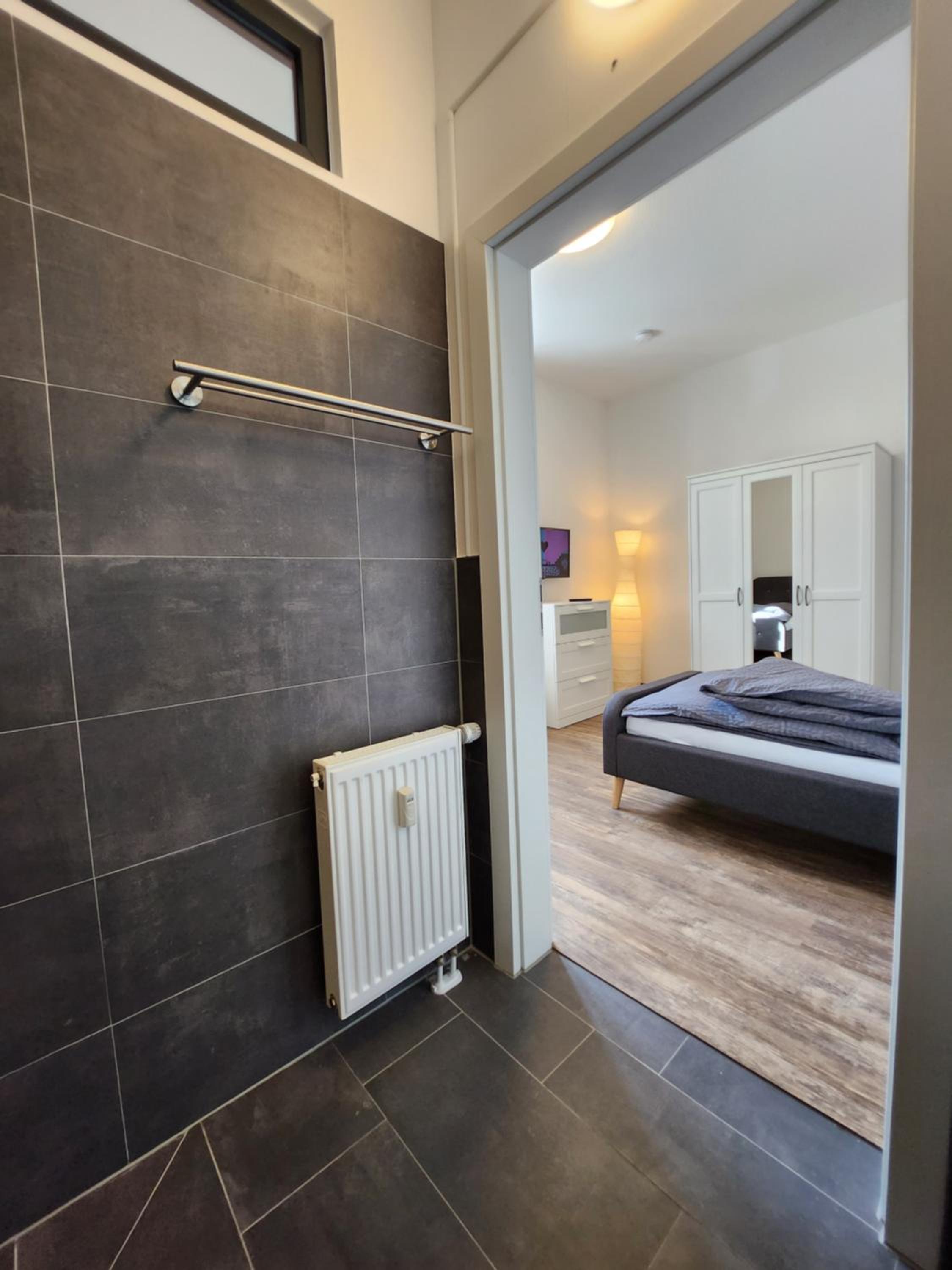 BIELEFELD CITY APARTMENTS - komfortable Einzelzimmer und Doppelzimmer - moderne Badezimmer, schnelles WLAN, Self-Check-In