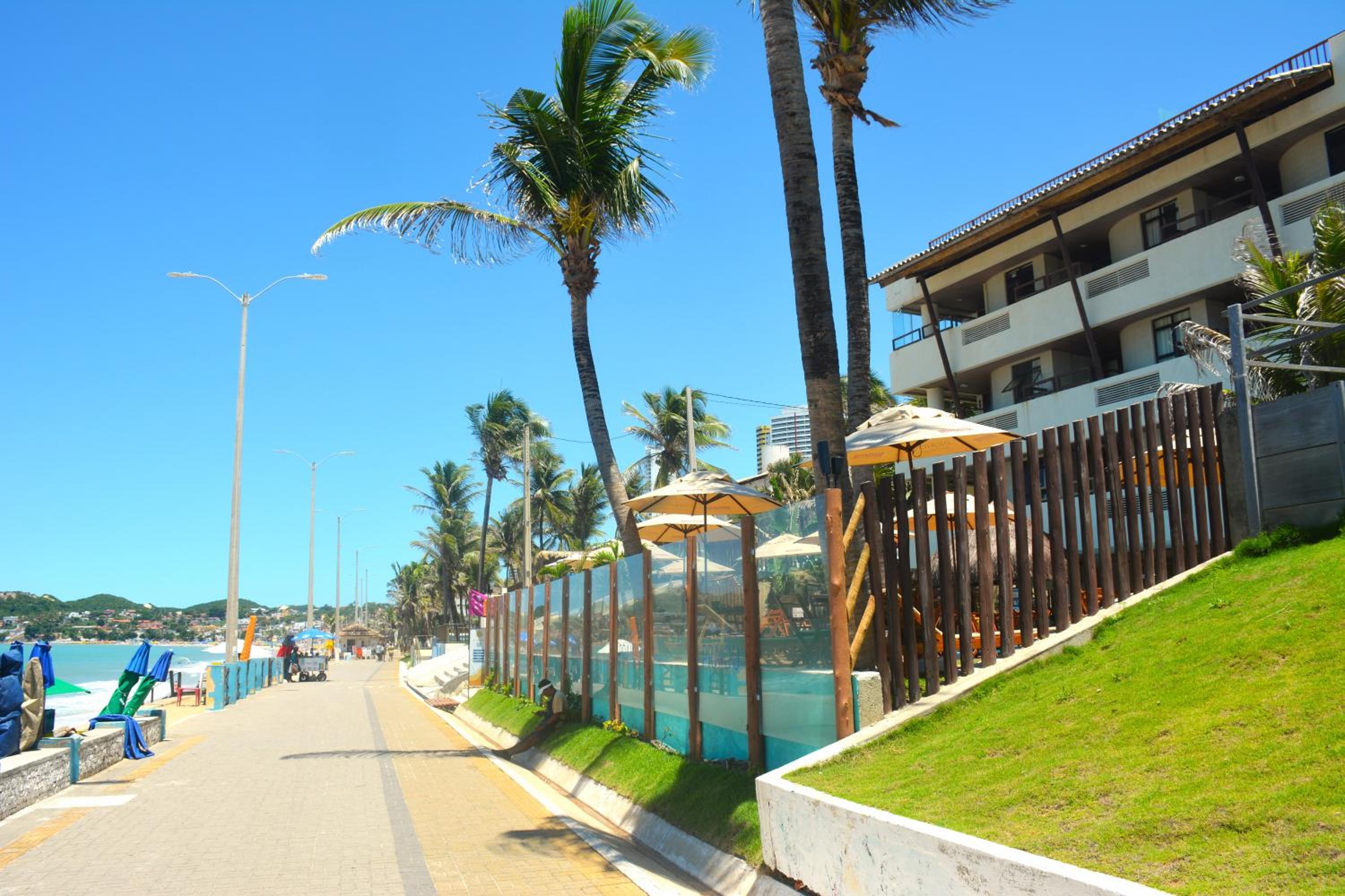 Na praia - Elegance 402 Luxo - Lateral vista mar