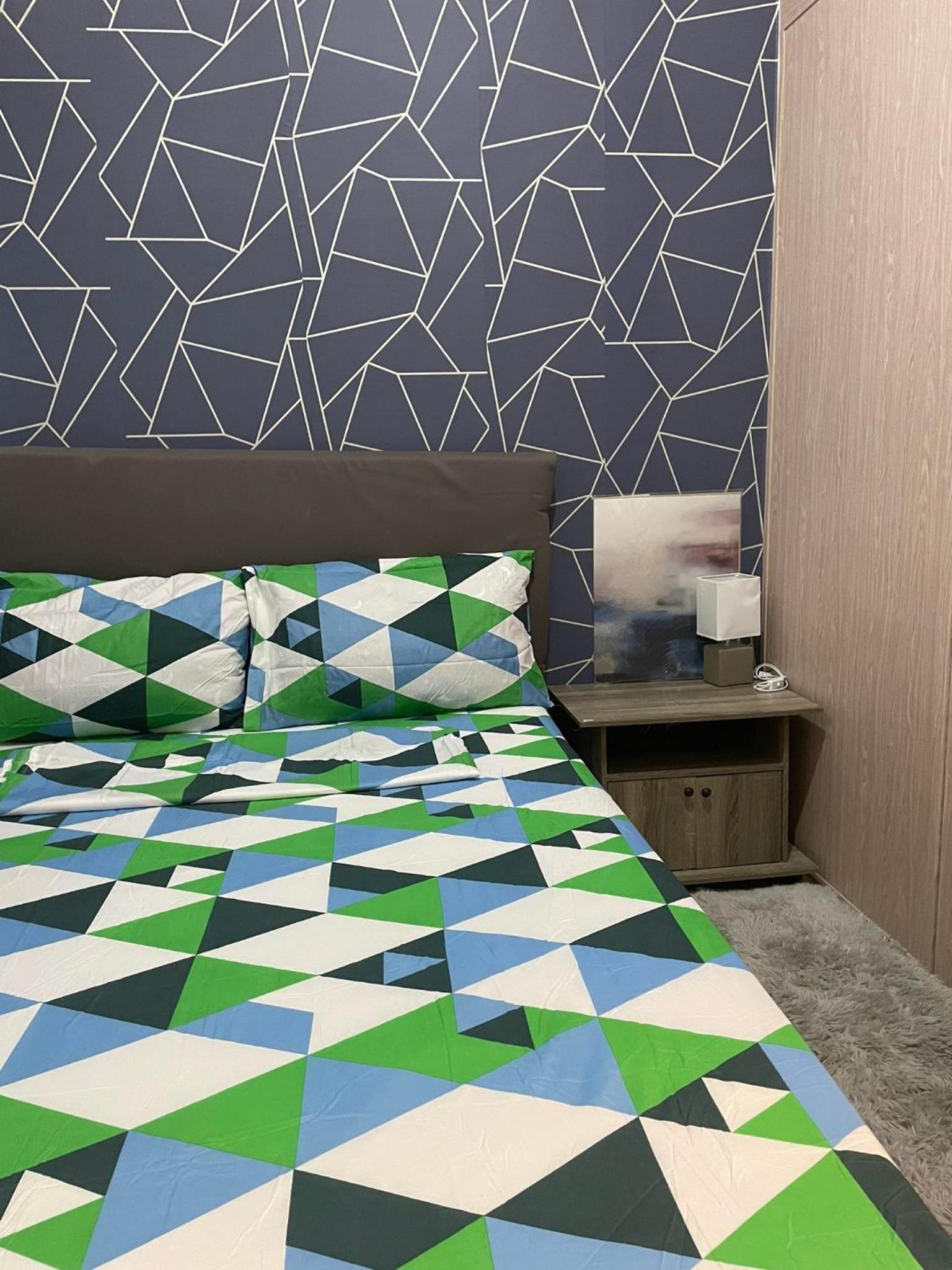 Anne and Gie 1 BR Condo Unit with kitchenette in Trees Residences SMDC view 4