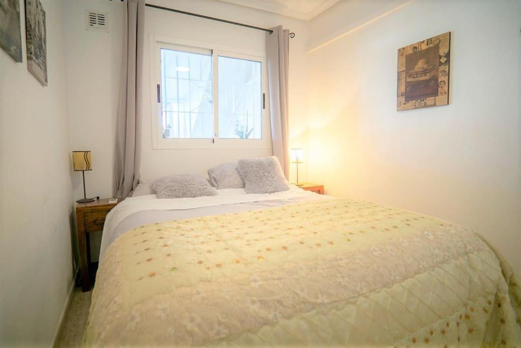 Spacious ground floor apartment overlooking the beautiful communal pool
