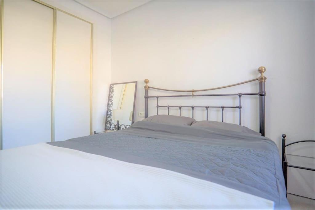 Spacious ground floor apartment overlooking the beautiful communal pool