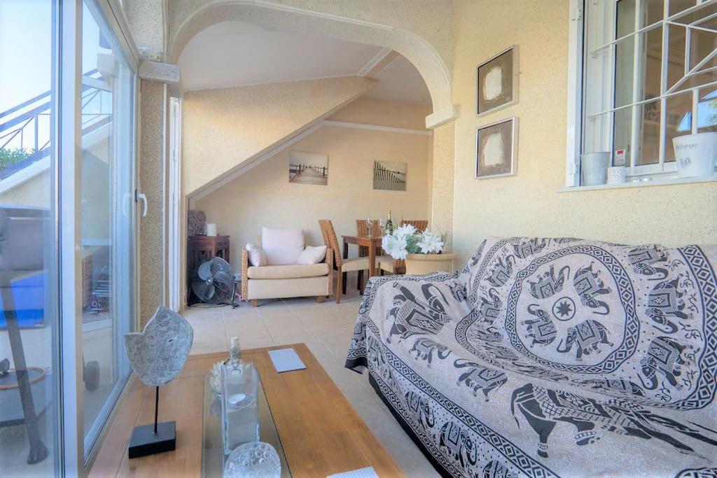 Spacious ground floor apartment overlooking the beautiful communal pool