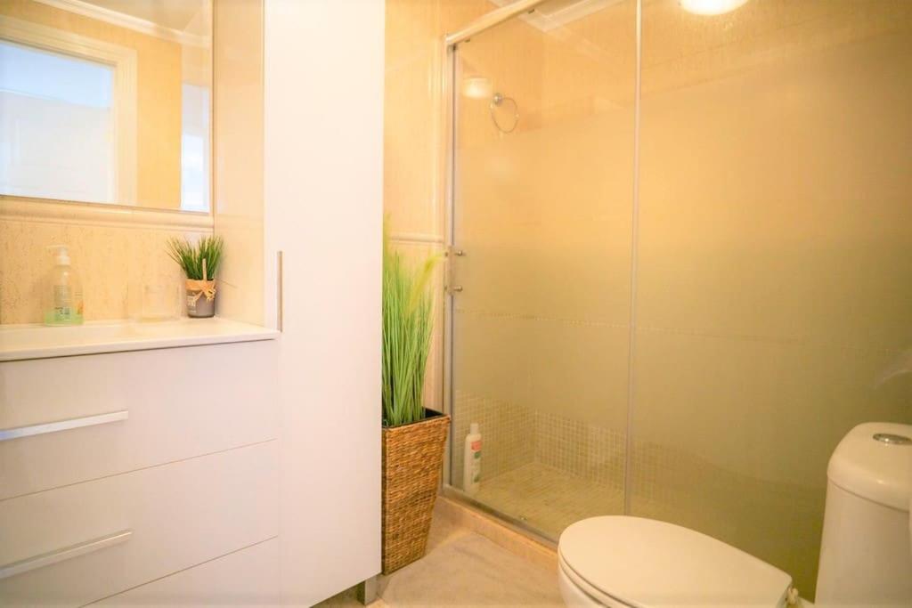 Spacious ground floor apartment overlooking the beautiful communal pool