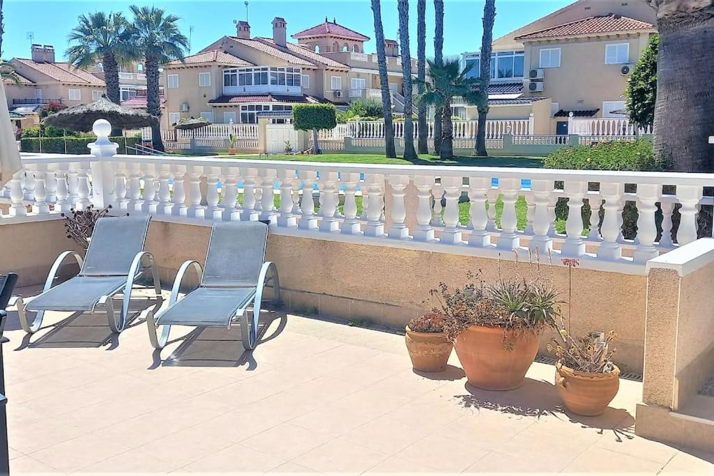 Spacious ground floor apartment overlooking the beautiful communal pool