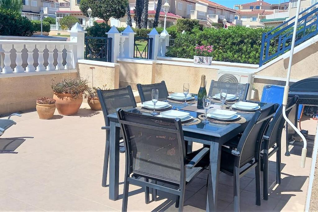 Spacious ground floor apartment overlooking the beautiful communal pool