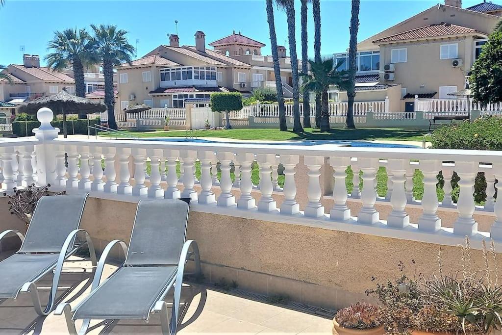 Spacious ground floor apartment overlooking the beautiful communal pool