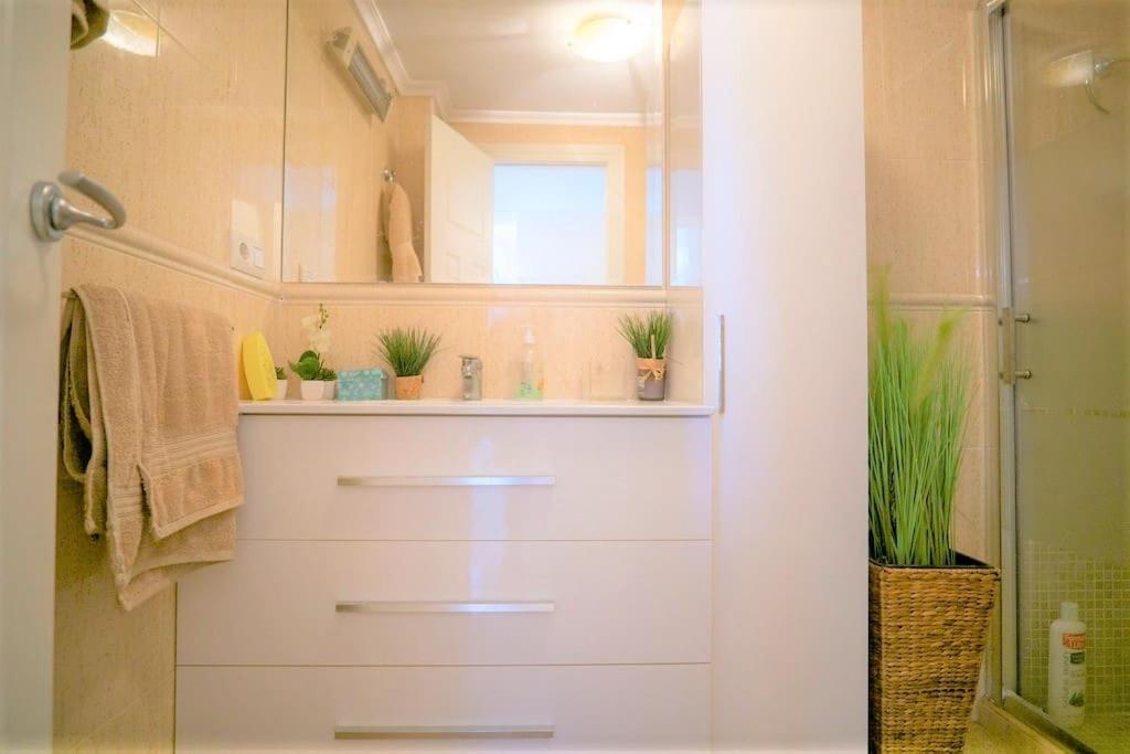 Spacious ground floor apartment overlooking the beautiful communal pool