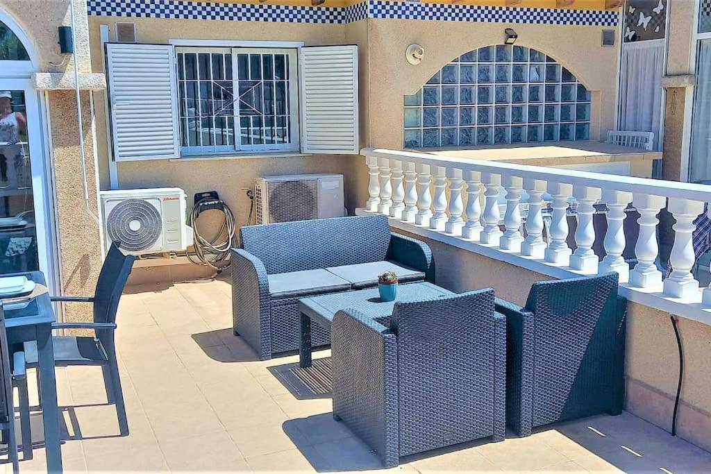 Spacious ground floor apartment overlooking the beautiful communal pool
