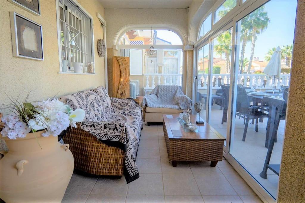 Spacious ground floor apartment overlooking the beautiful communal pool