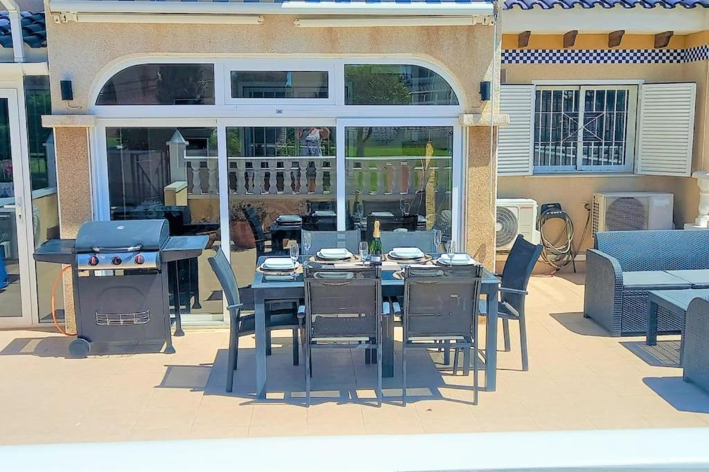 Spacious ground floor apartment overlooking the beautiful communal pool