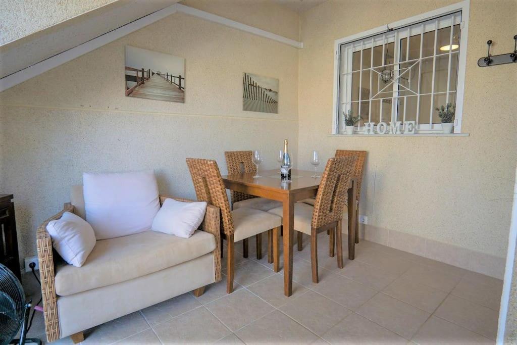 Spacious ground floor apartment overlooking the beautiful communal pool