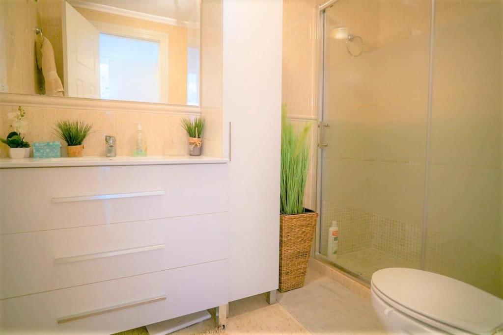 Spacious ground floor apartment overlooking the beautiful communal pool
