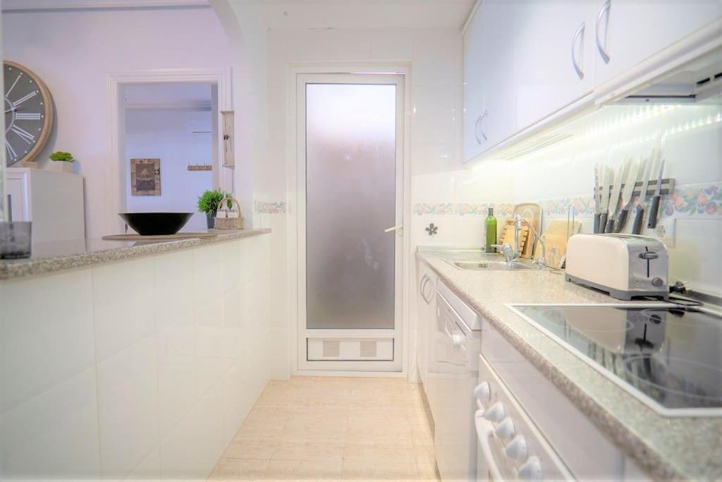 Spacious ground floor apartment overlooking the beautiful communal pool