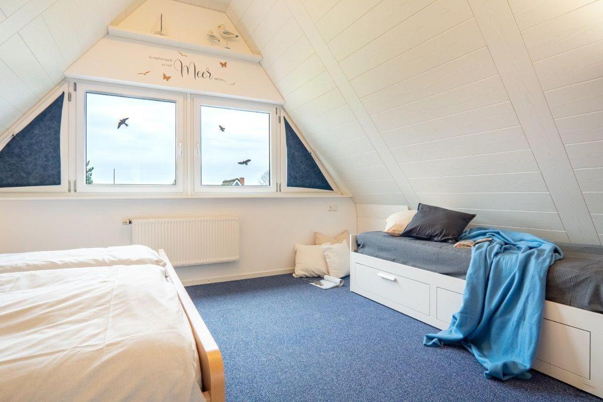 Am-hohen-Ufer-Reetdach-Haus-Ocean-Breeze-123