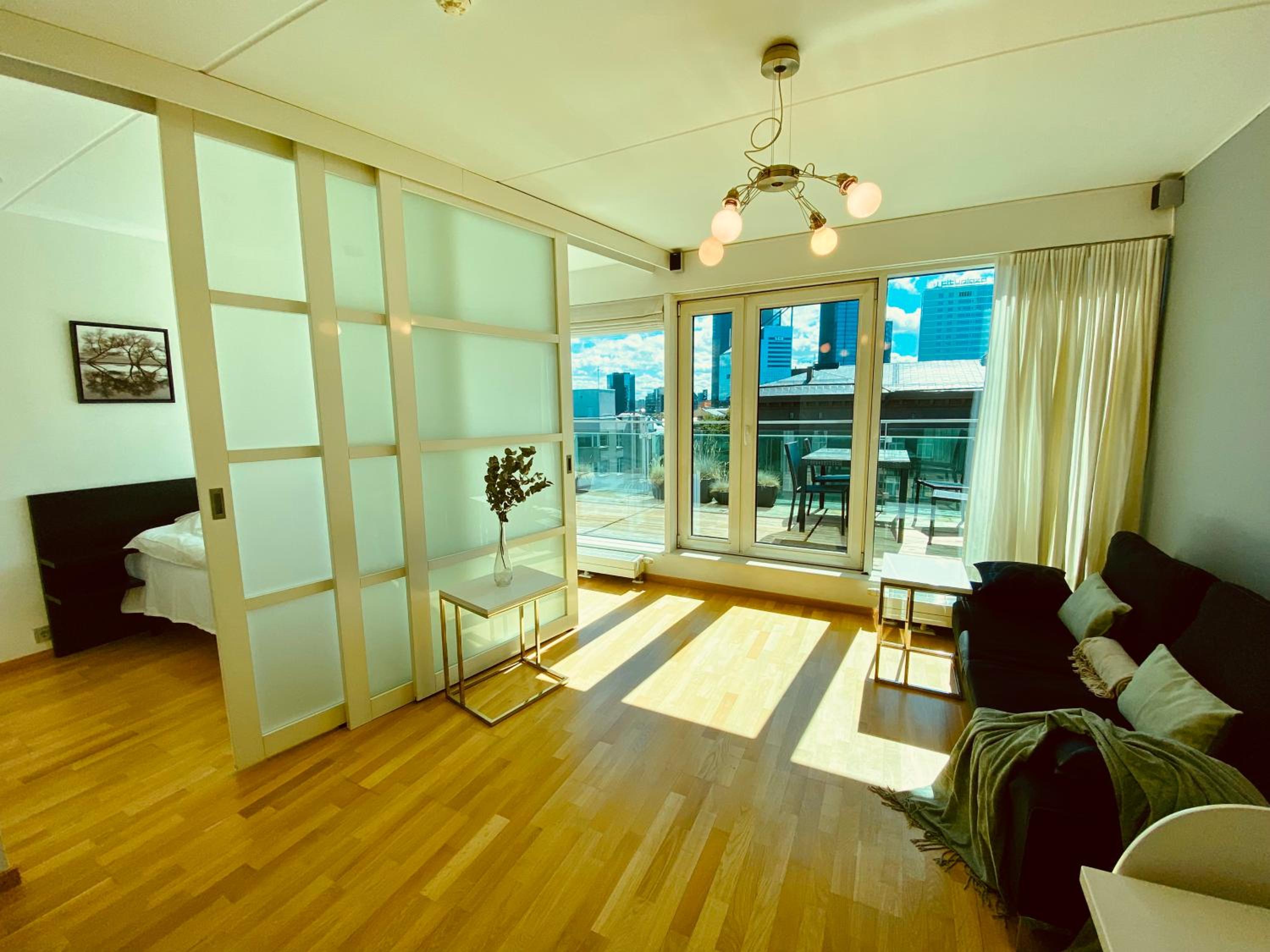 City Heart Apartment with a Sunny Rooftop Terrace