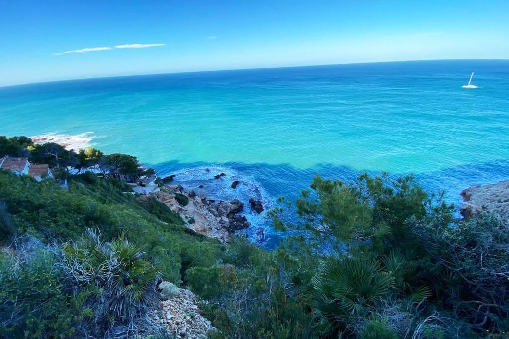 Apartamento en primera línea de playa con piscina y garaje gratuito