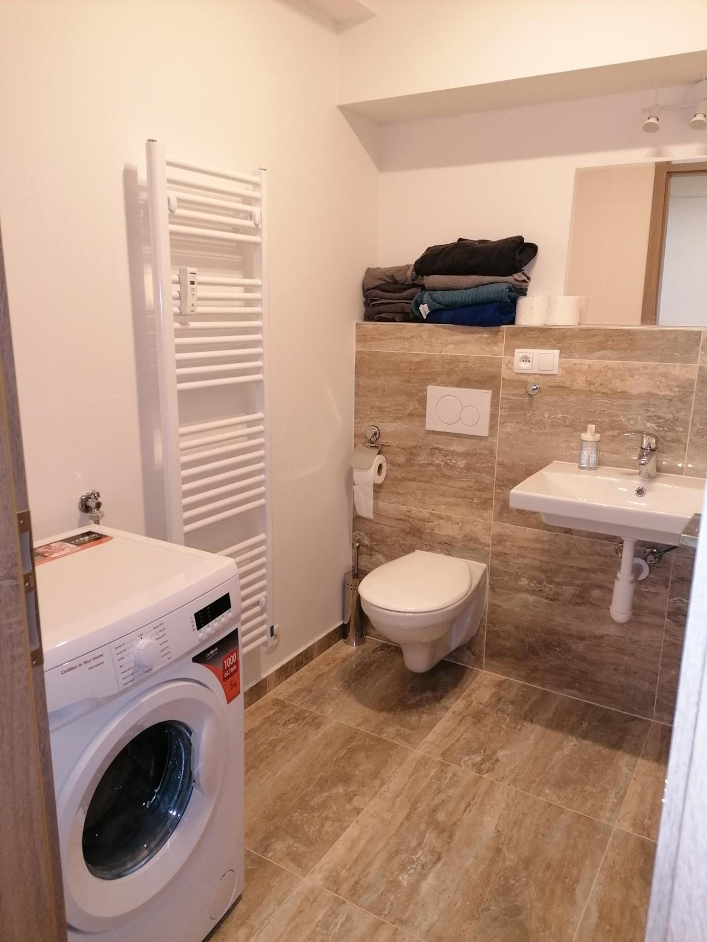 Brand new studio apartment #51 with free secure parking in the center