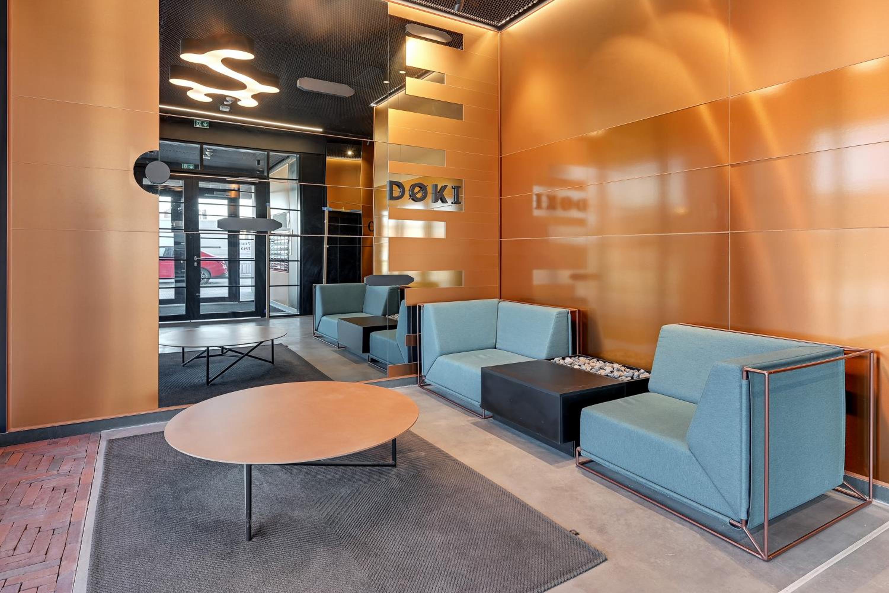 DOKI Living - Foodhall & Parking by Downtown Apartments