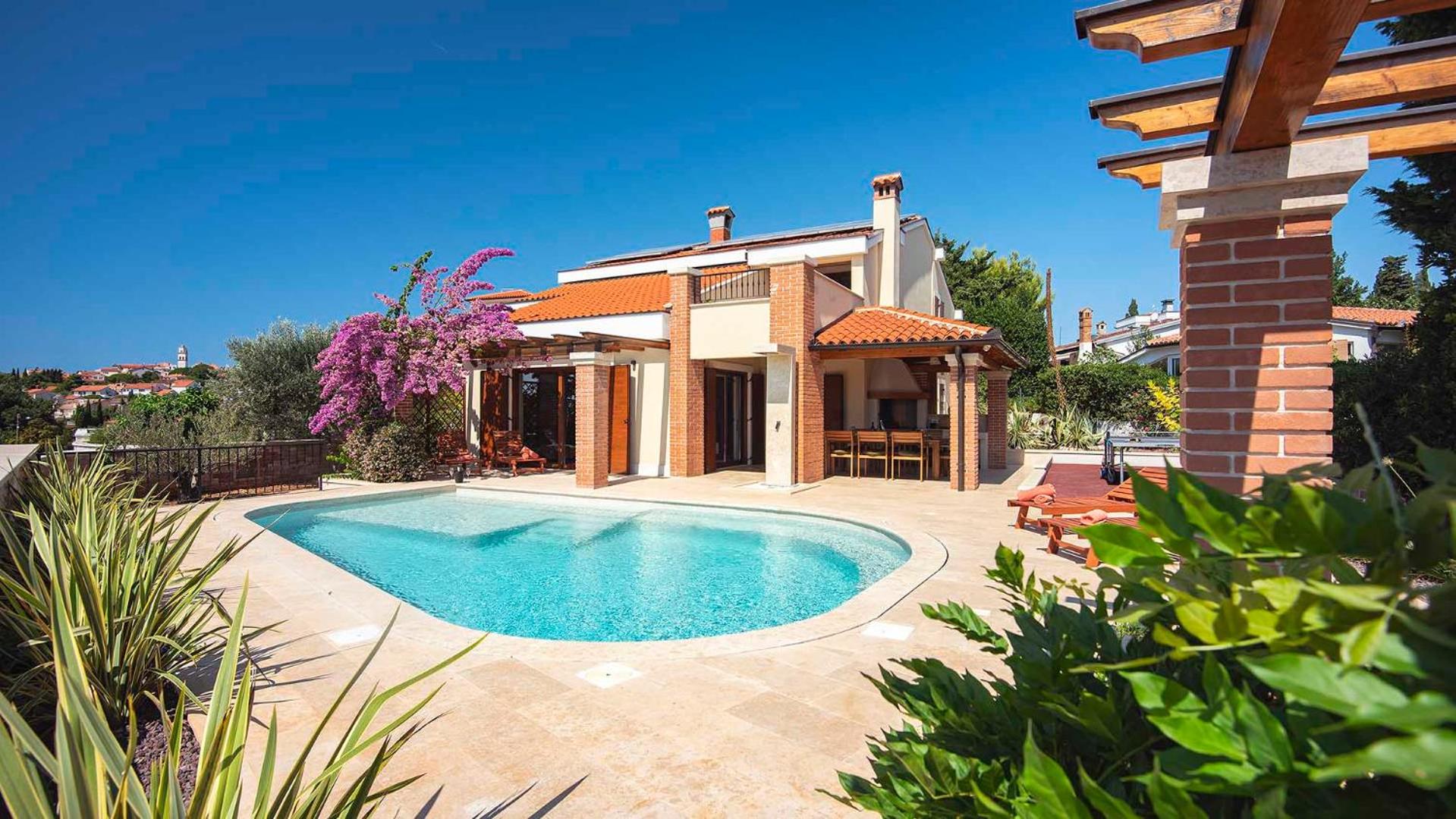 Modern poolside villa in Premantura view 3