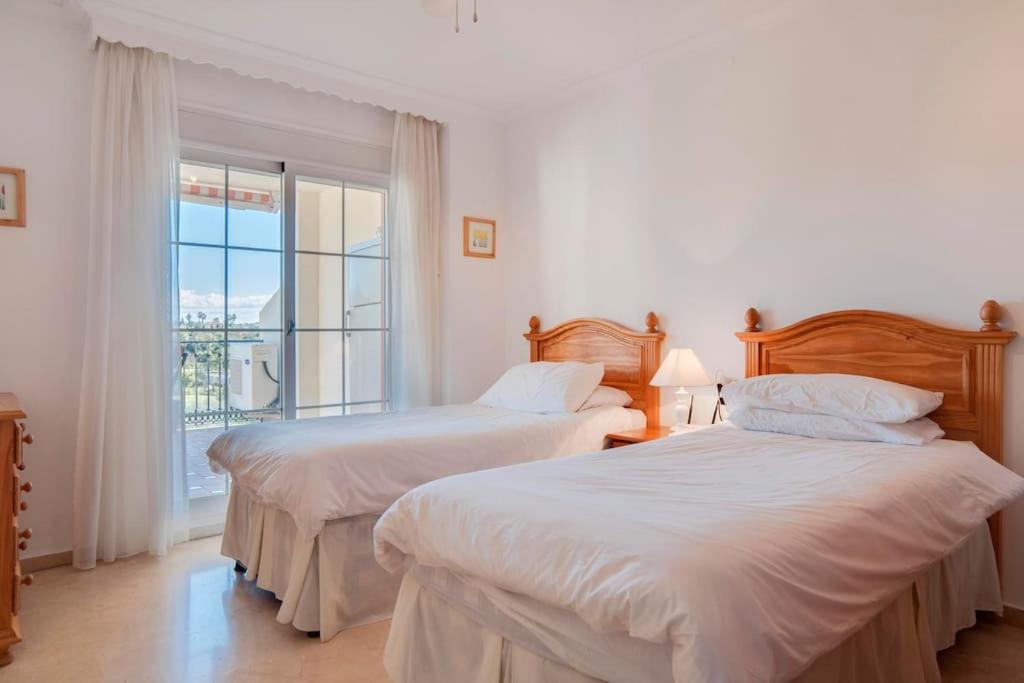 Sunny terrace apartment in prestigious Mijas Golf