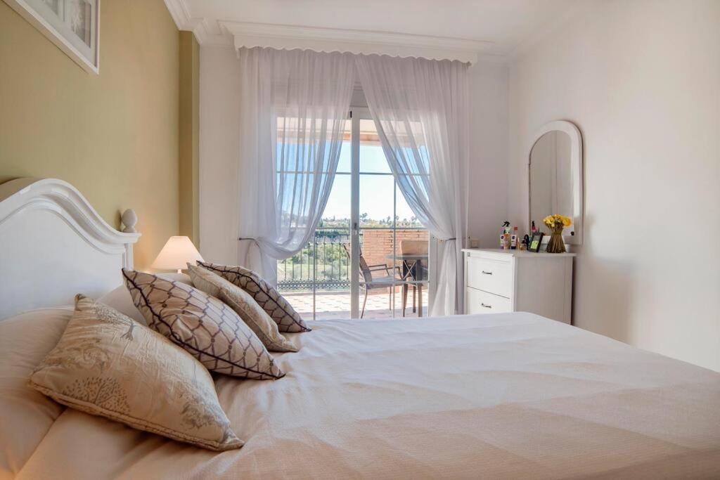 Sunny terrace apartment in prestigious Mijas Golf