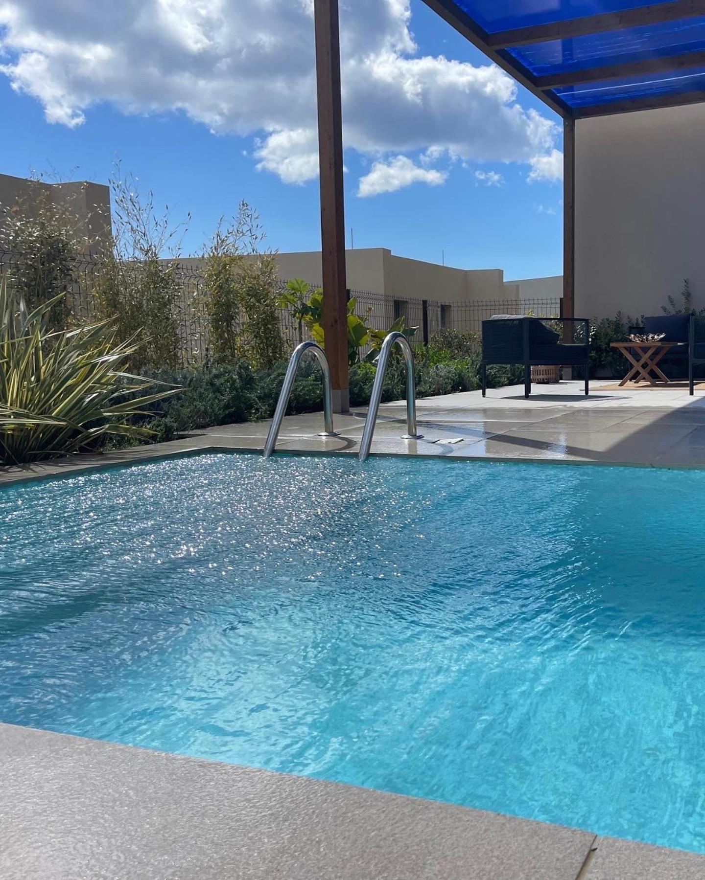 Green Coast beach villa with pool, hot tub & sauna