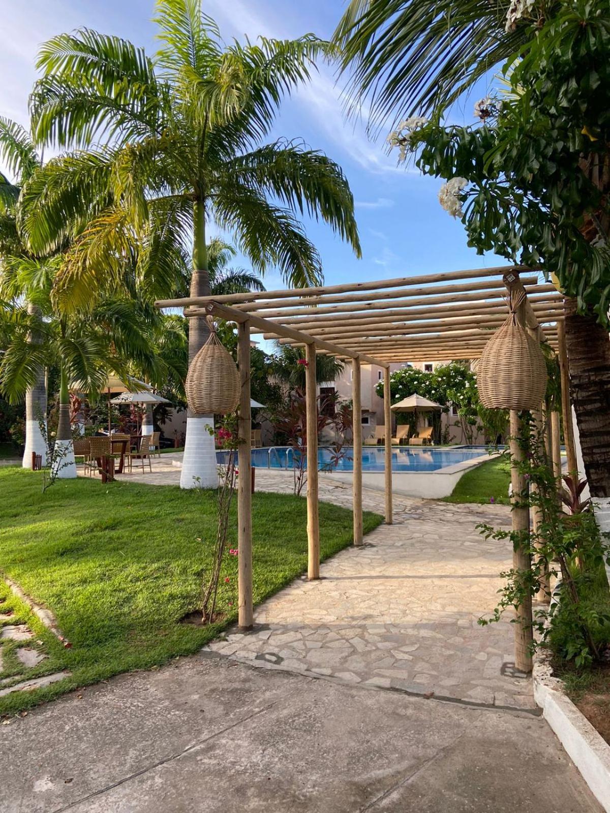 Casa aconchegante em condomínio arborizado