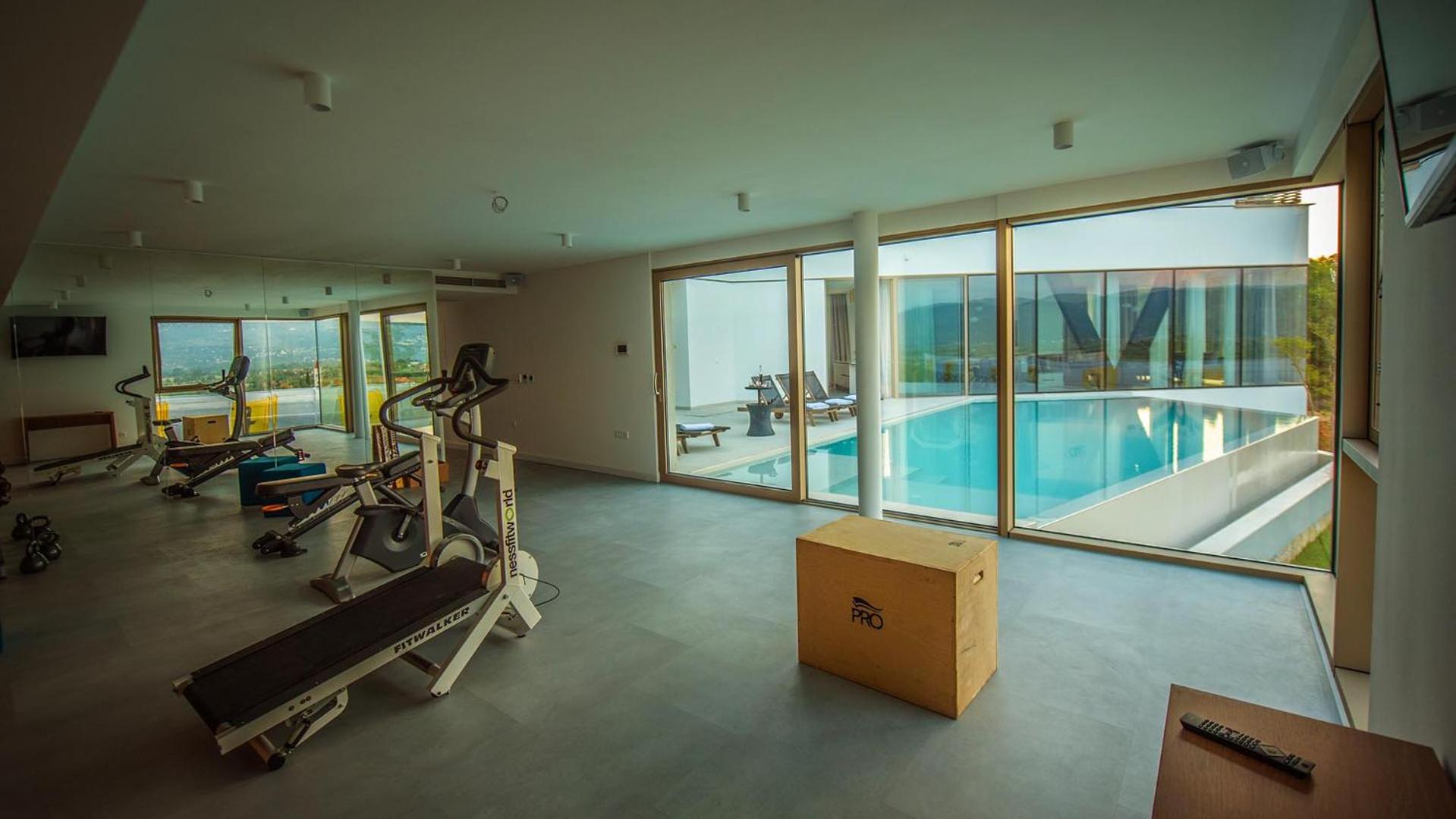 A modern villa in Zmijavci with a gym, tennis and basketball court view 5