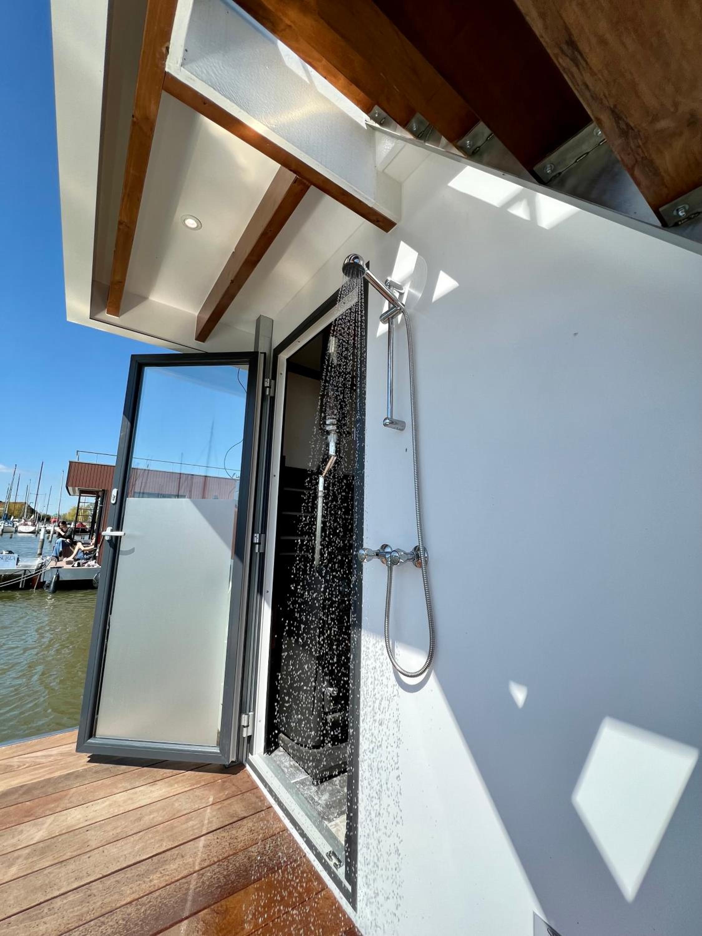 Luxury Houseboat Liberdade with sauna and dinghy view 4